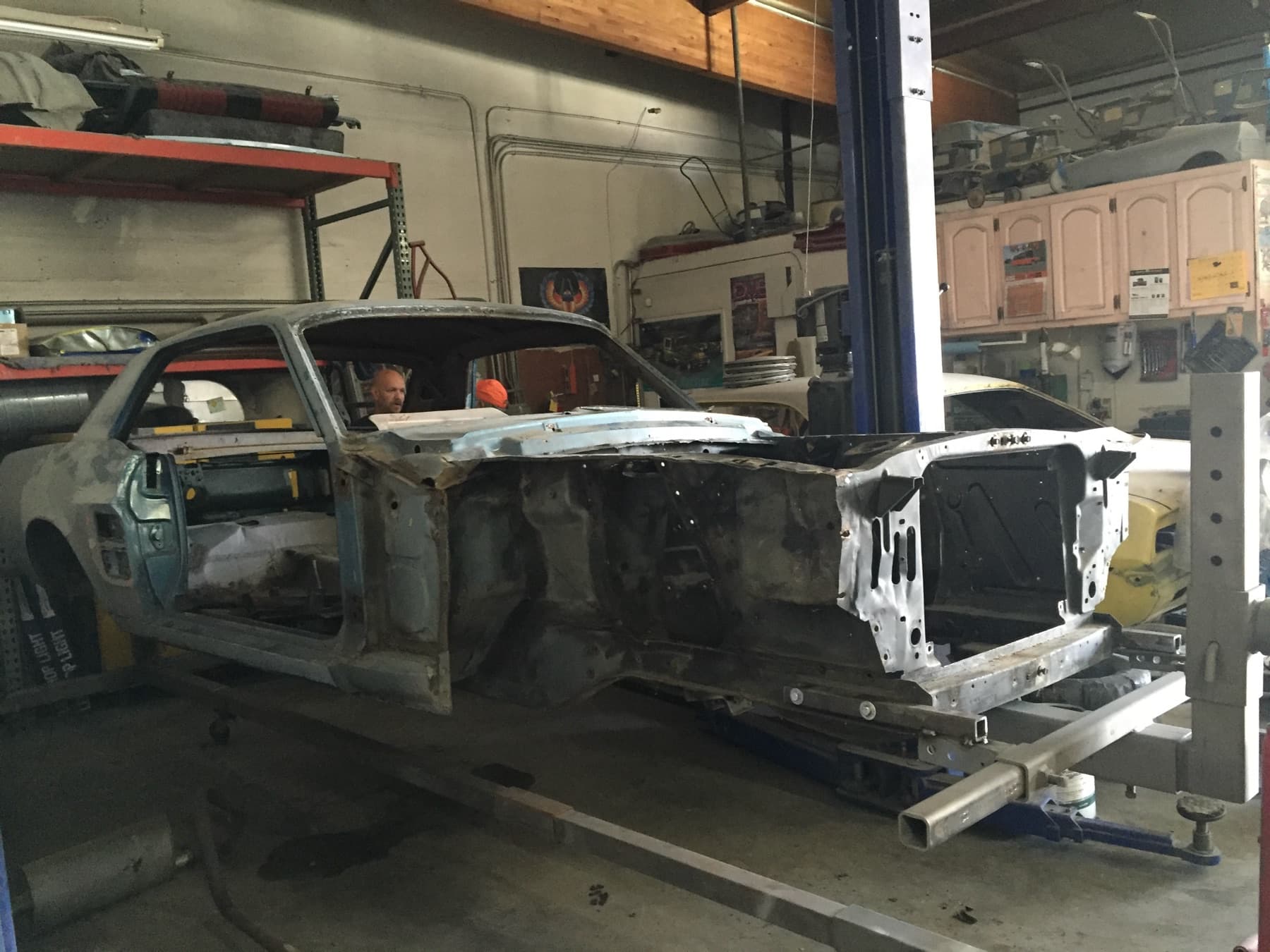 The '67 on the lift at the shop